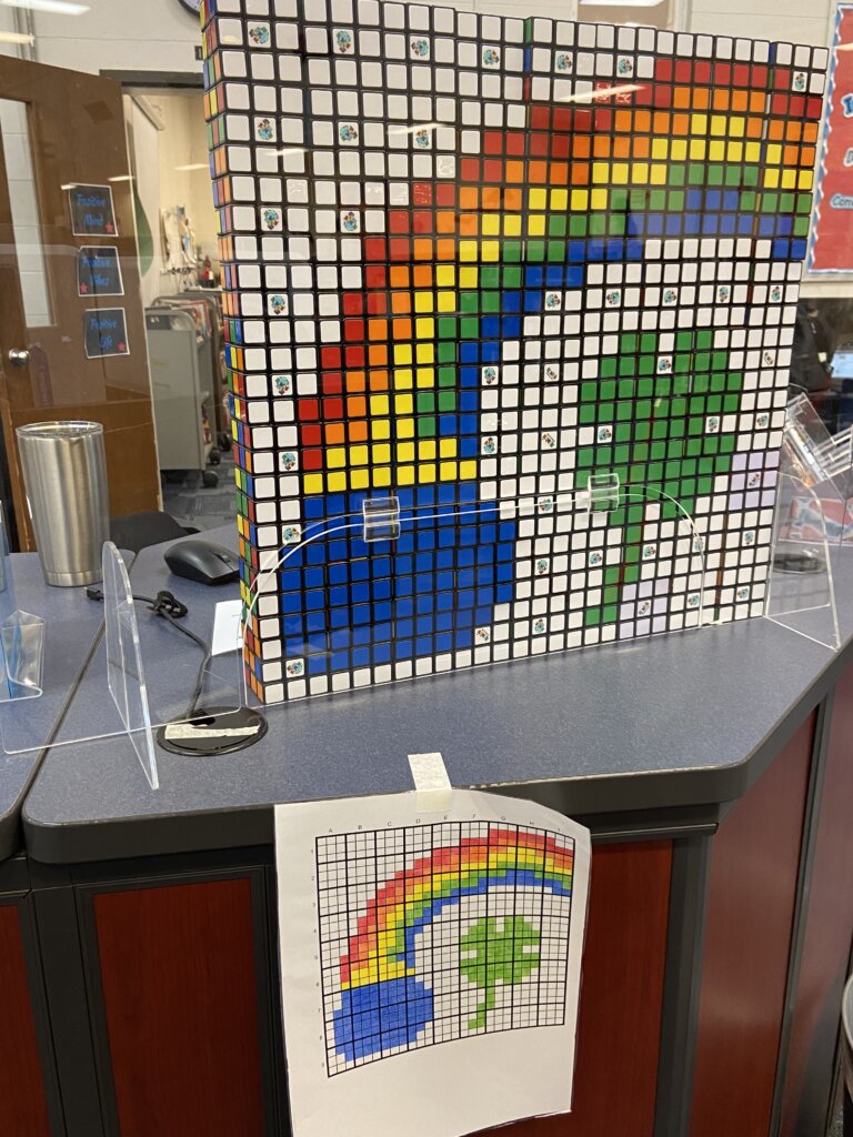 A colorful mosaic featuring a rainbow and a shamrock, created during Grove City High School Library's "No Tech Tuesday" program.
